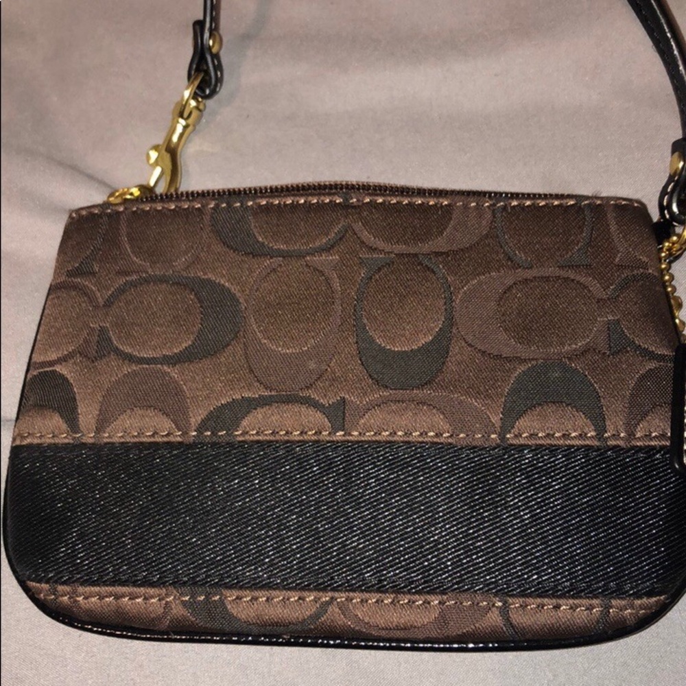 Brand new Coach wristlet
